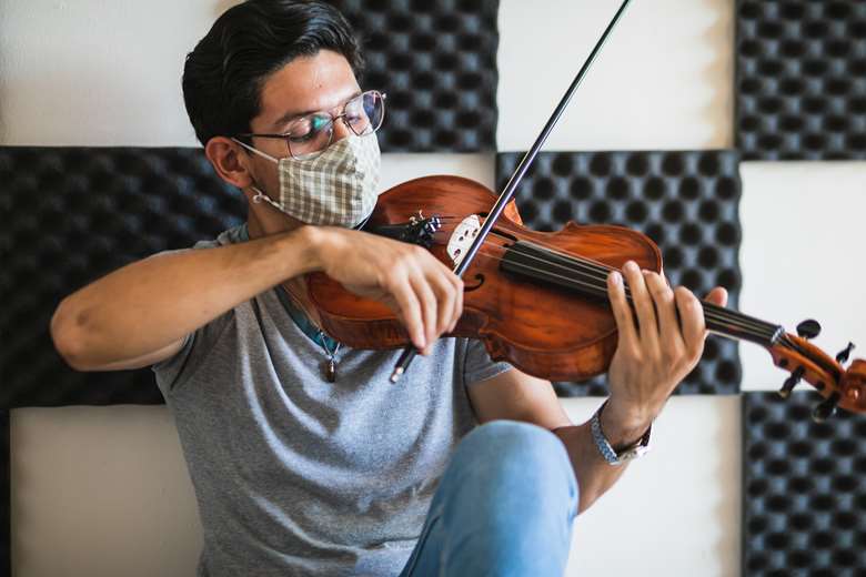 Performing with a mask is something musicians have had to get used to