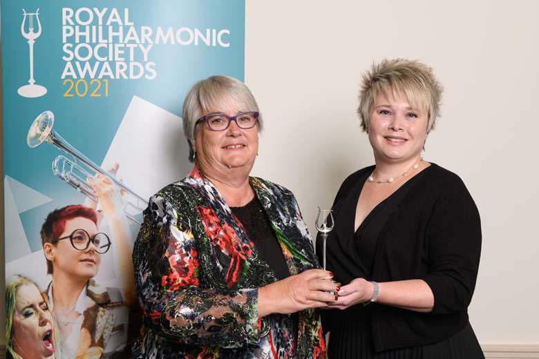 Hilary Campbell (Right) & Joi Demery, chair of the Bristol Choral Society (Left) receive the RPS Inspiration Award