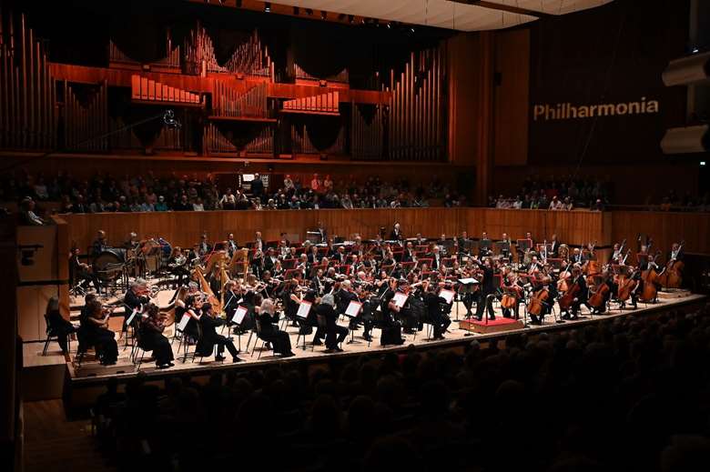 The 100 musicians of the Philharmonia on stage performing An Alpine Symphony (c) Mark Allan