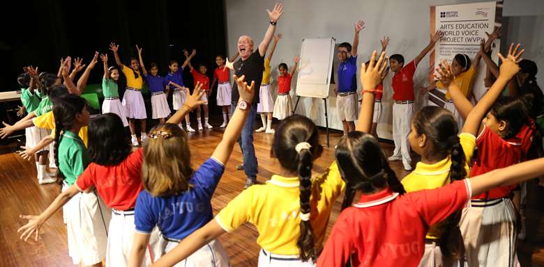 Richard Frostick running a singing session for World Voice