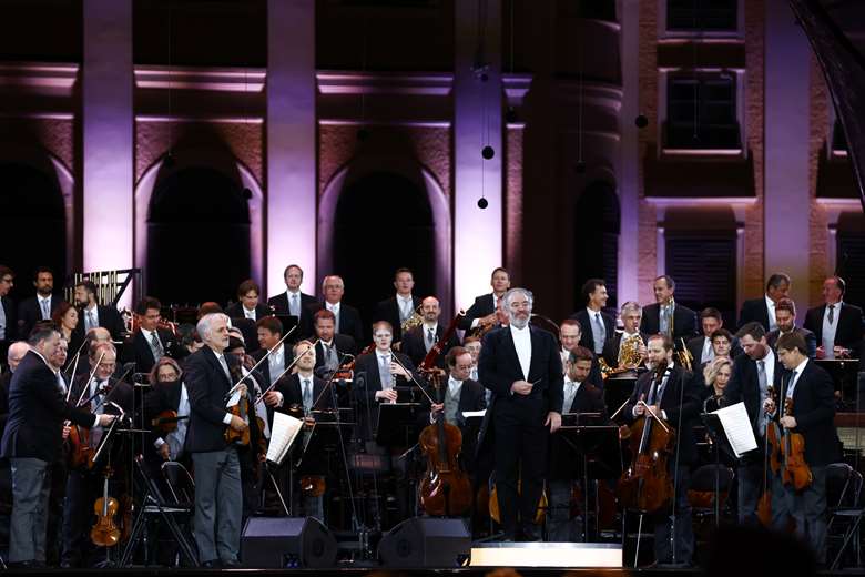 Valery Gergiev performing with the Vienna Philharmonic Orchestra at the Summer Night Concert in Vienna