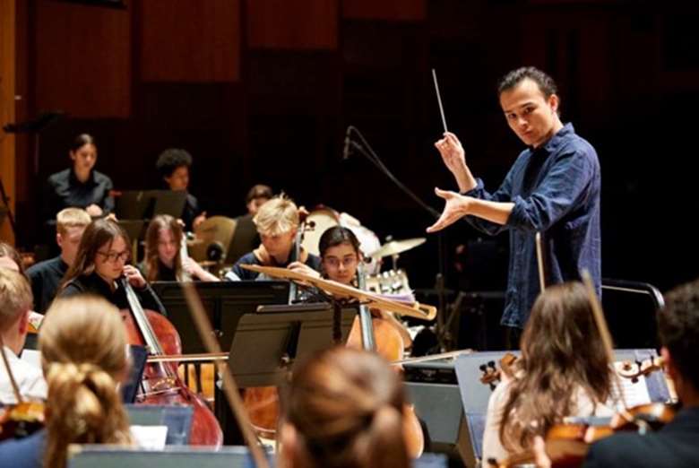 Otis Enokido-Lineham conducting the LSSO at the LSSO & CYM Anniversary Concert this year ©Kevin Leighton