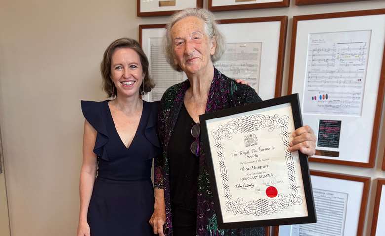 Composer Thea Musgrave (right) receives honorary membership from Vanessa Reed, President and CEO of New Music America (left)