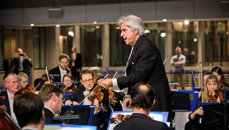 The Oxford Philharmonic Orchestra performs with conductor Marios Papadopoulos at NATO headquarters (2019) (Image courtesy of NATO)