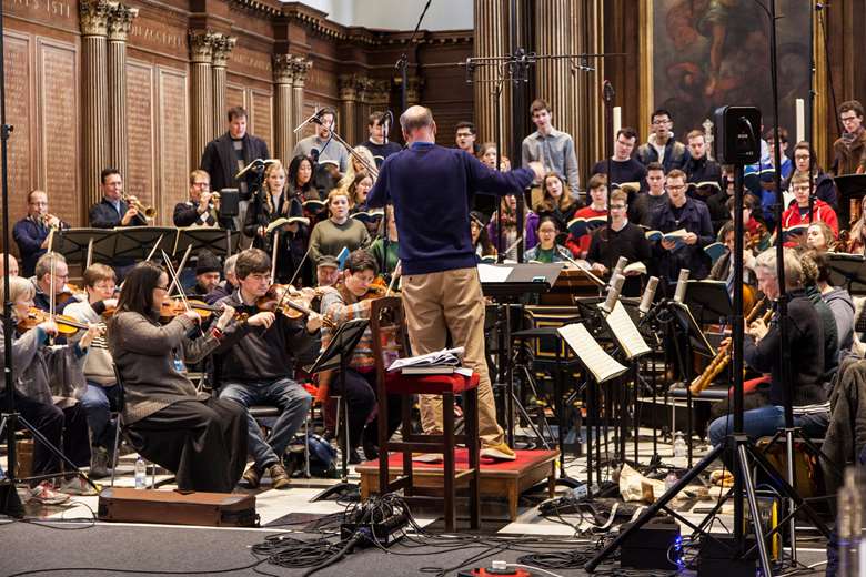 Layton conducts Trinity College Choir in recording sessions for B Minor Mass in Trinity College Chapel with the Orchestra of the Age of Enlightenment © Graham CopeKoga