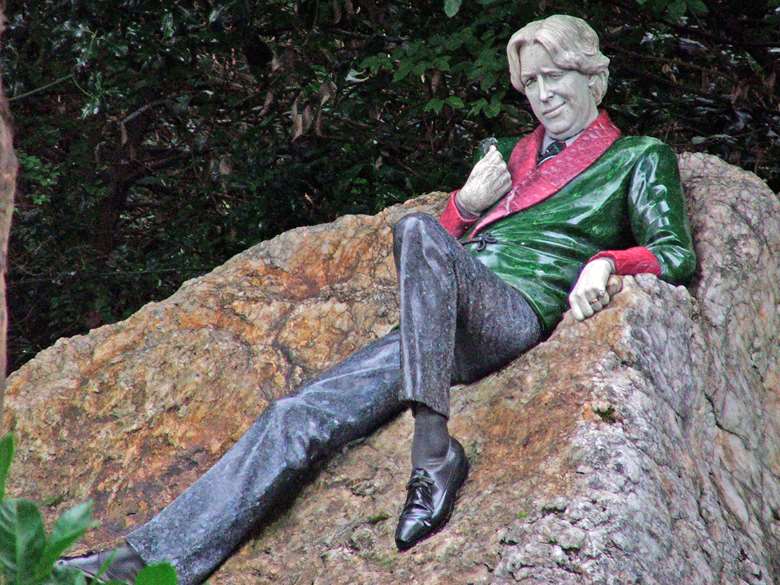 The legacy of the Irish poet is celebrated through the Oscar Wilde Memorial Sculpture in Merrion Square in Dublin, Ireland which was unveiled in 1997 ©Adobe Stock