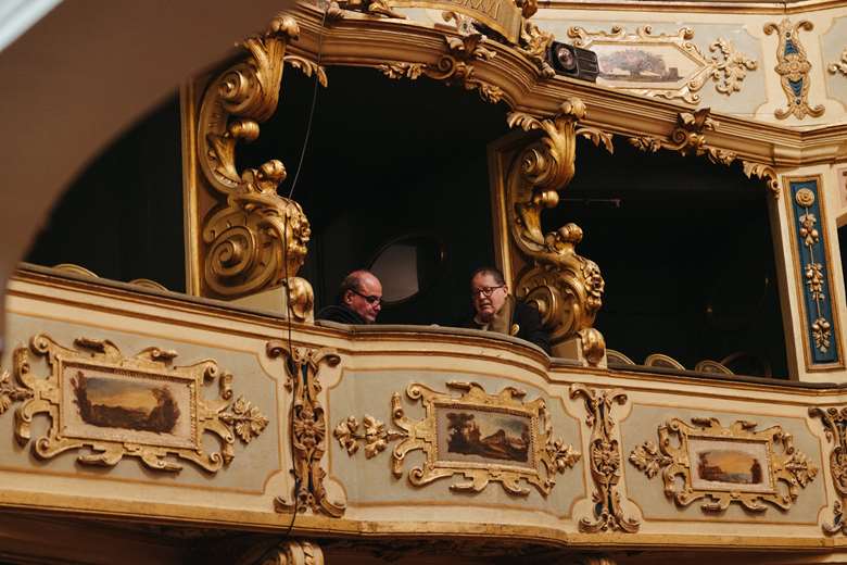 Festoval director and founder Kenneth Zammit Tabona (on the right) in a box at the festival's heart, Malta's Teatru Manoel (Image courtesy of Valetta baroque festival)