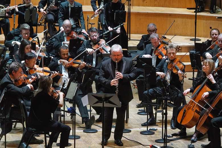 Michael Collins: 'As a musician you always remember your very first important concert and for me, my very first important concert was with the Ulster Orchestra' Collins with the Ulster Orchestra in November 2024 (Image courtesy of Ulster Orchestra)